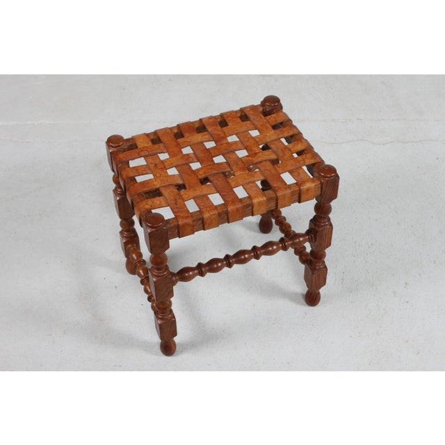 Old stool in the style of Axel Einar Hjorth and Martin Nyrop. It's handcrafted in Denmark in the 1930s by a Danish...