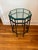 Striking vintage American octagonal side table featuring a substantial patinated bronze frame and a thick, green-tinted...