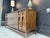 An iconic example of American mid-century modern design, this stunning 66-inch Broyhill Brasilia credenza has been...
