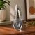 A signed vintage Kosta Sweden crystal bud vase, model H3053, handcrafted in Sweden circa the 1960s. This elegant...
