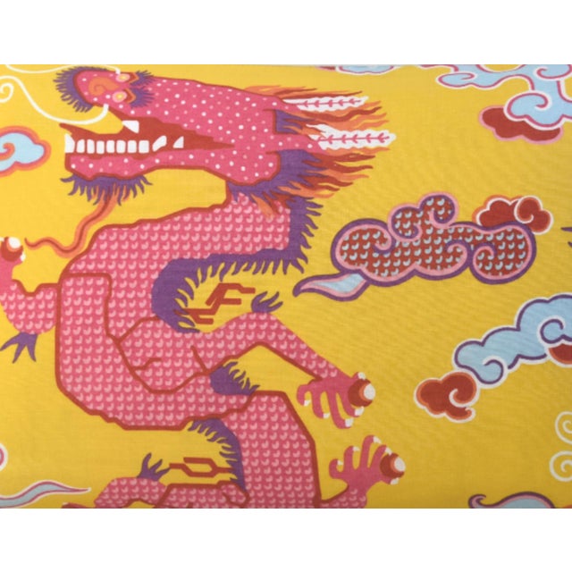 This pillow features Magical Ming Dragon by Johnson Hartig/Libertine for Schumacher. Hand-printed, stylized dragons are...