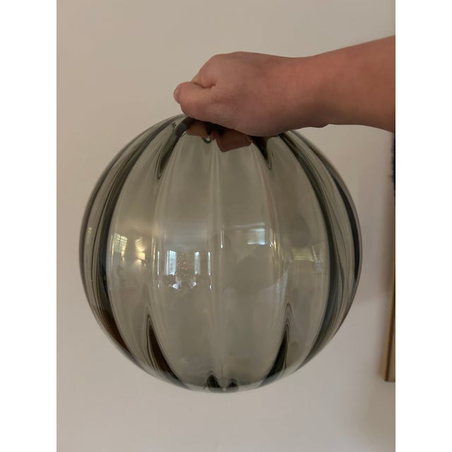 Brand new, never installed Roll & Hill Pendant 01, with Fume glass globe with ripple texture and oil rubbed bronze finish....