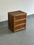 A versatile small three drawer chest / nightstand in the British colonial style. Compromised of bamboo skeleton and cane...