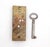 Reclaimed cabinet door mortise lock made of brass with a key. These locks were commonly used for cupboards or furniture...