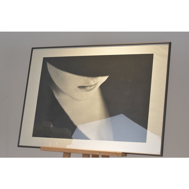 The interplay of light and shadow and the suggestion of an erotic aura. "MONIQUE" by Michel Ibelings, shown here in a...