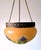 Decoration object, used to hang plants from the ceiling. The inner basket for plants is no longer present.