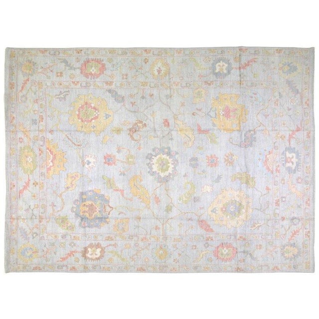 Hand-knotted with care using traditional rug-making techniques, this wool rug blends timeless craftsmanship with a modern...