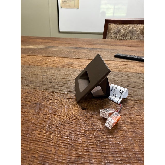 Brand new, never installed. We changed the design of our project and went with a different fixture. Comes with housings...