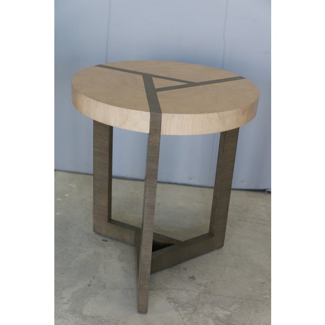 Description From the Manufacturer Bleached olive ash burl veneer top in a geometric pattern with intersecting white oak...