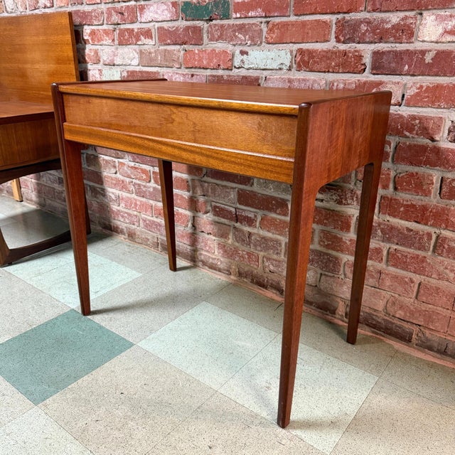 Exceptionally-rare vintage mid-century modern teak and Afromosia console table or desk designed by John Herbert for A....