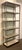 Original retail $5616. Stylish Caracole Modern Deep Bronze and Greige Shelf Life Etagere, Reeded glasss back, showroom...