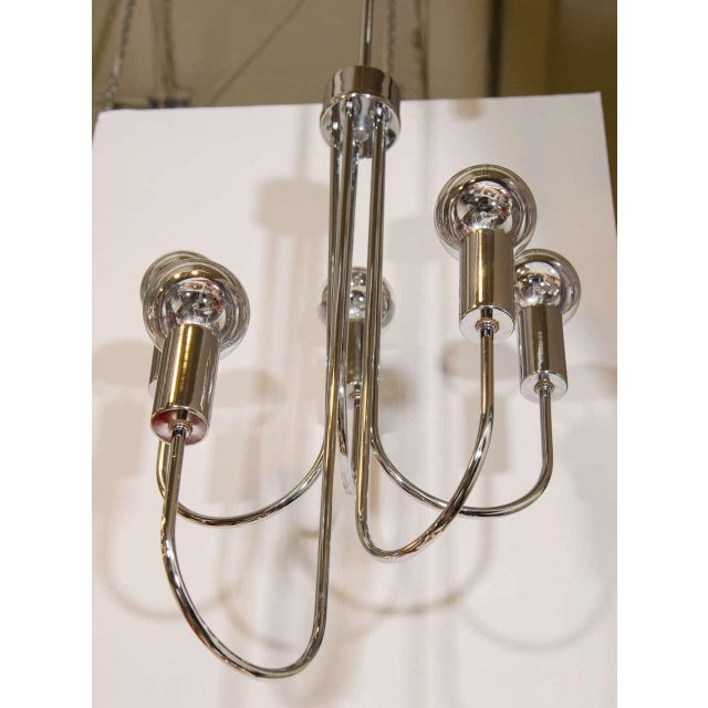 Gaetano Sciolari Style Chrome Five-Branch Chandelier, with J-form arms and dome shades. 36” H x 16” Diameter. Provenance:...
