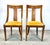 An elegant pair of antique inlaid European side chairs of mahogany and satinwood with goldenrod velvet / velour...