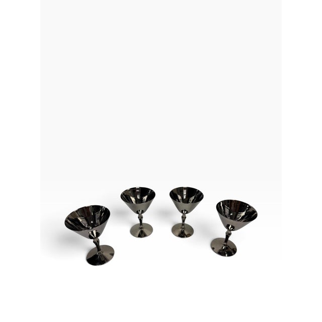 Infuse your cocktail hours with striking vintage drama with this set of 4 Art Deco revival martini glasses. Crafted with...