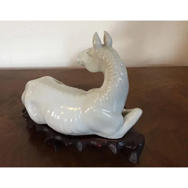 Antique Chinese Export Porcelain Blanc de Chine Model of a Recumbent Horse on Carved Wood Stand For Sale - Image 4 of 11