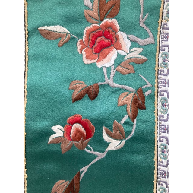 A Vintage Chinese Silk Embroidered Tapestry with Bird and Blossom Brocade Panel. The intricate needlework depicting a bird...