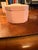 This Vintage Wedgwood Pink Jasperware Octagonal Trinket Pill Box features a charming Cupid motif, making it a lovely...