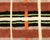 A patchwork of sun-warmed color, woven into quiet geometry. This hand-knotted wool rug unfolds in a mosaic of bold color-...