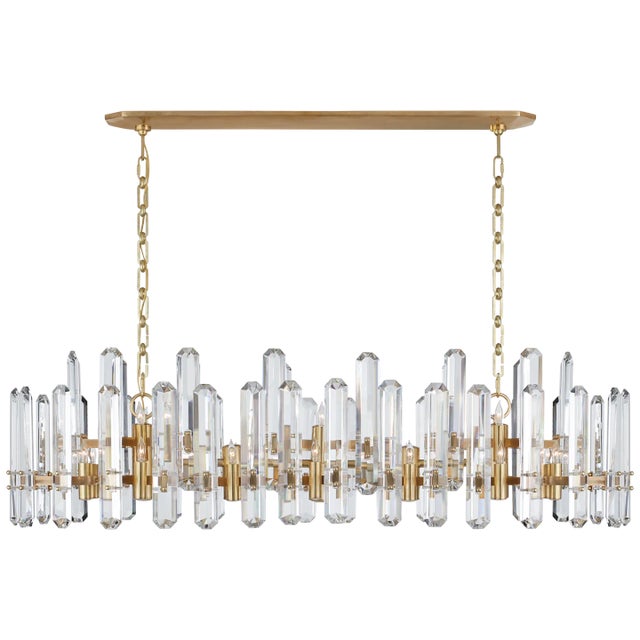 Bonnington Large Linear Chandelier in Hand-Rubbed Antique Brass with Crystal Designer: AERIN Canopy: 6" x 38" Oval...