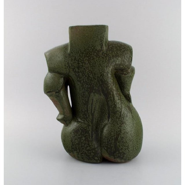 French studio pottery. Organically shaped unique vase in glazed stoneware. Beautiful glaze in dark green shades....