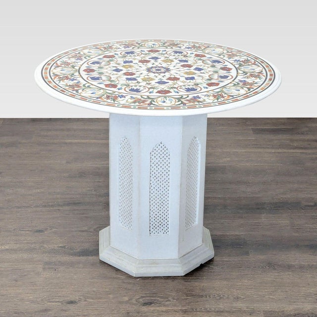Pietra Dura Marble table-tops are handmade and contain marble slabs inlaid with pure and natural semi-precious stones like...
