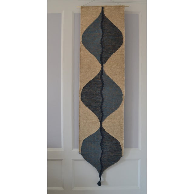 Inspired by the serene geometry of Villa Skärtofta, these handwoven tapestries are crafted in wool and flax, dyed with...