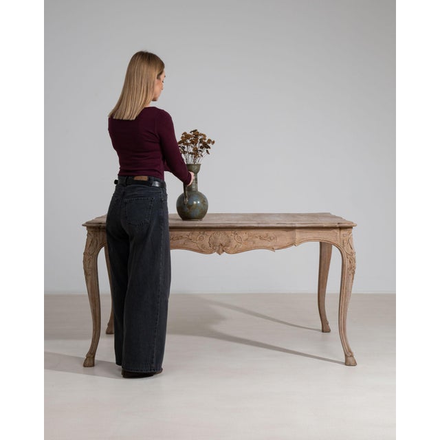 Carved cerused oak console in Weathered Whitewash. The weathered whitewash surface highlights scalloped apron, cabriole...