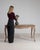 Carved cerused oak console in Weathered Whitewash. The weathered whitewash surface highlights scalloped apron, cabriole...