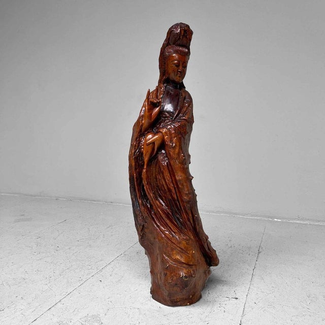 Beautifully sculpted image of the goddess Kannon from a temple in Japan. The statue is made from a single piece of wood of...