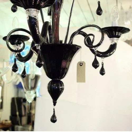 Three arms black colour blown glass chandelier Venetian Chandelier. Made in Italy. This piece is designed in the style of...