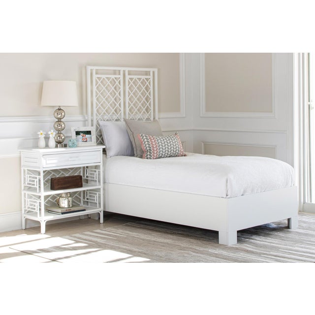 Bring a touch of modern sophistication to your bedroom with the stunning X & Diamond bed. Handcrafted from rattan, each...