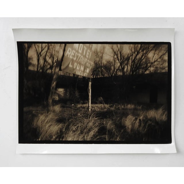 Vintage circa 1990's photograph on heavy paper by Eric C. Weller (20th century) Texas. Dark sepia toned semi glossy...