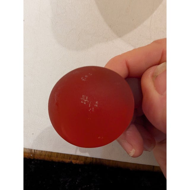 An early 1980s Venetian bottle in Frosted Murano glass in a vibrant yellow with orange tint and blue glossy rim which...