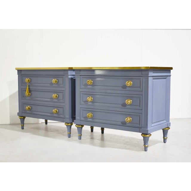 A fresh, elevated take on classic French style, this pair of Karges side tables has been newly painted in a rich blue with...
