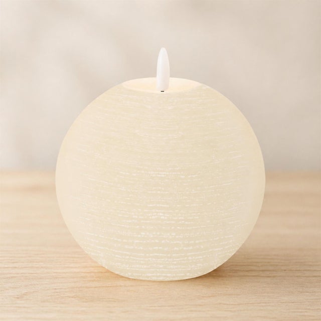 Add a touch of elegance to your space with the FIA Wick Ivory Round Candle. Featuring a cool ivory tone and smooth finish,...