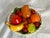 Charming Italian ceramic fruit bowl featuring brightly painted, life size apple, banana, orange, lemon, pear, cherries and...