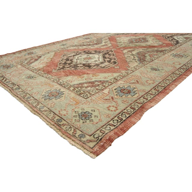 52415 Vintage Turkish Oushak Rug, 04'09 x 11'03. Immerse yourself in the allure of this hand-knotted masterpiece – a...