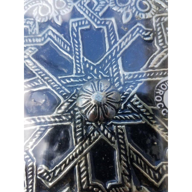 Very exotic hexagonal all metal inlaid Moroccan side table. With its detailed carving along the sides and the top, this...