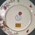 A beautiful Chinese Famille Rose porcelain charger (plate). The white ground is finely hand-painted with a classic "Nine...
