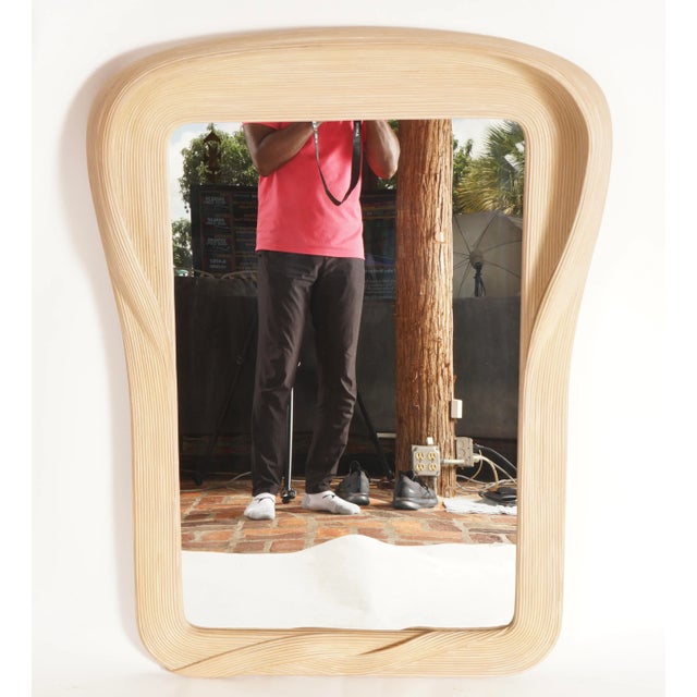 With no sharp edges; the mirror lines flow smoothly throughout the entire piece. It was designed by world renowned...