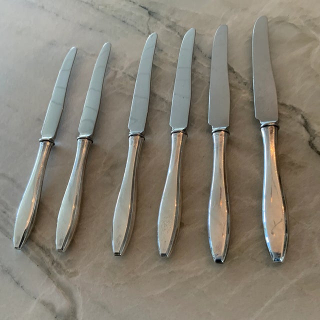 Beautiful set of Mappin & Webb sterling silver knives with stainless steel finger point blades. Their simplicity allows...