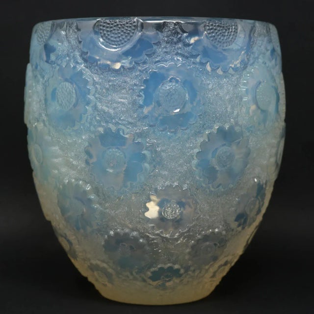 Rene Lalique opalescent glass 'Paquerettes' vase. This pattern features daisies in relief around the outside. Stenciled...