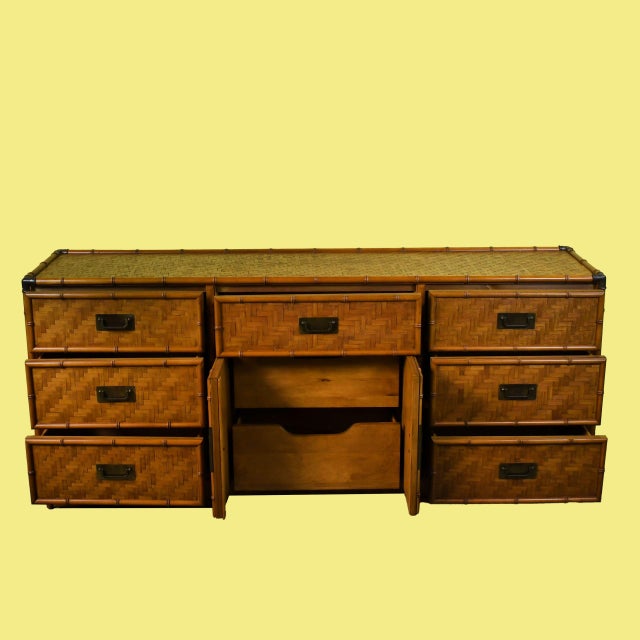 Organize in coastal style with this vintage faux bamboo and wrapped rattan dresser. The quality craftsmanship and bamboo-...