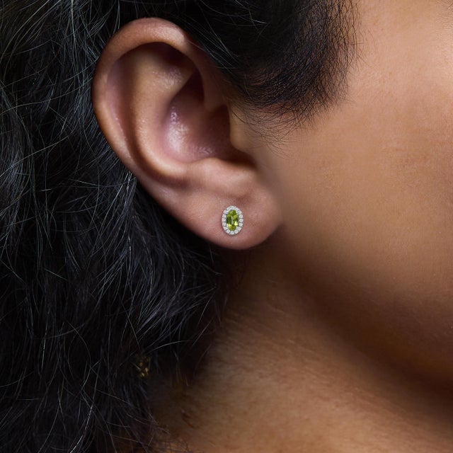 10K White Gold 5x3 MM Oval Green Peridot and Diamond Halo