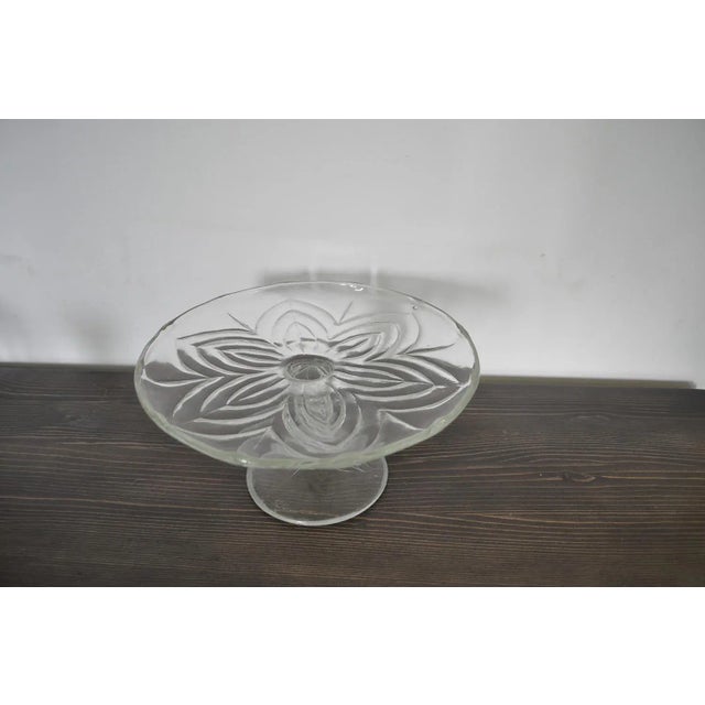 This is an antique cake stand from Europe.