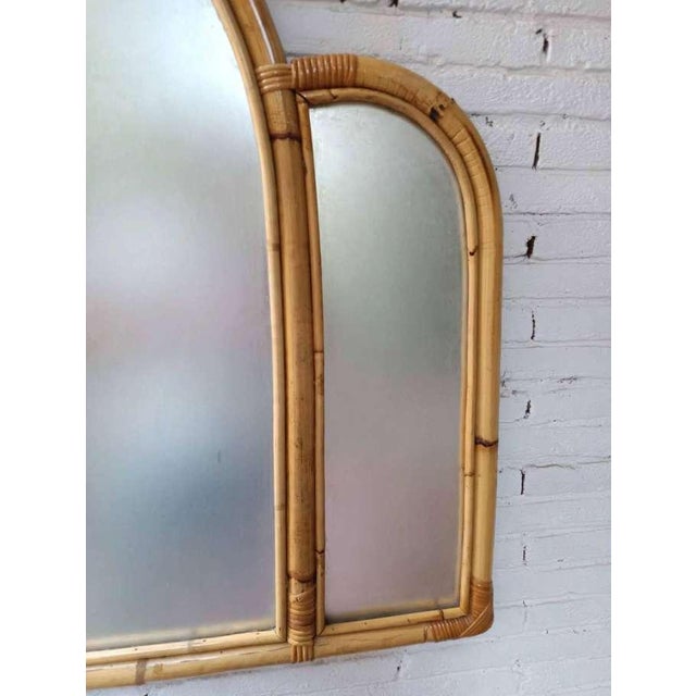 Refined boho chic mirror with a generous size and distinctive shape. Elegant