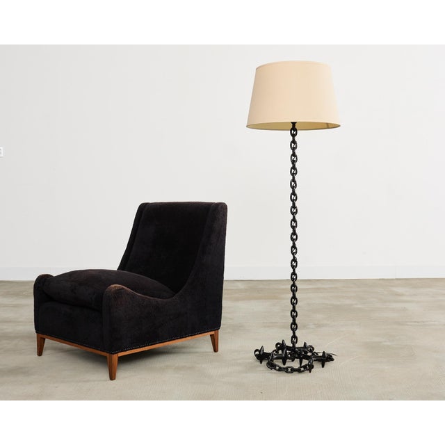 Spectacular 20th century French patinated iron chain link floor lamp in the iconic manner and style of Franz West. The...