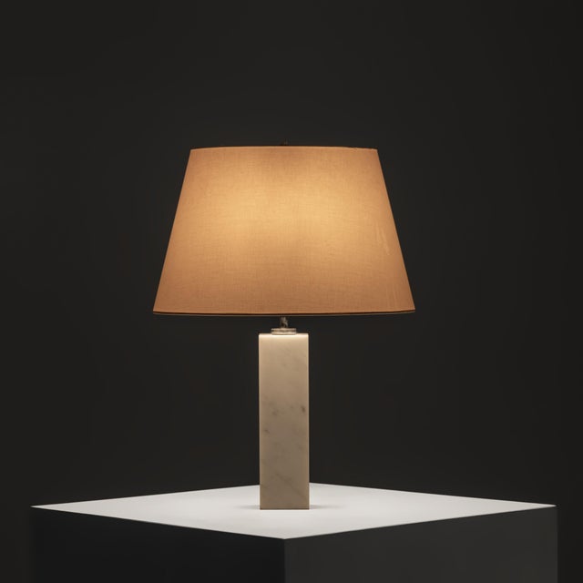This refined Model 180 table lamp was designed by Florence Knoll for Knoll International. Defined by its architectural...