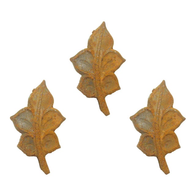 Add a certain "je ne said quoi" style to your home or office with this lovely trio of artisan crafted iron leaves. Perfect...