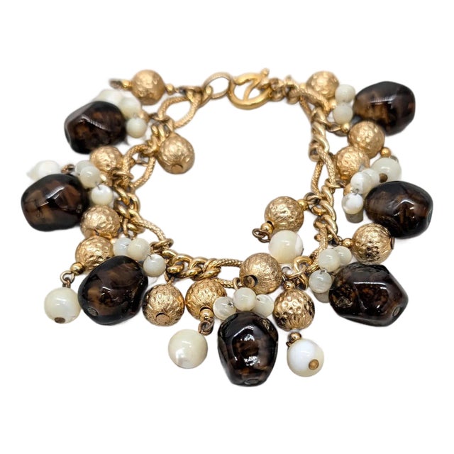 Vintage 1960s Signed Napier Goldtone Faux-Topaz & Mother of Pearl Charm Bracelet For Sale